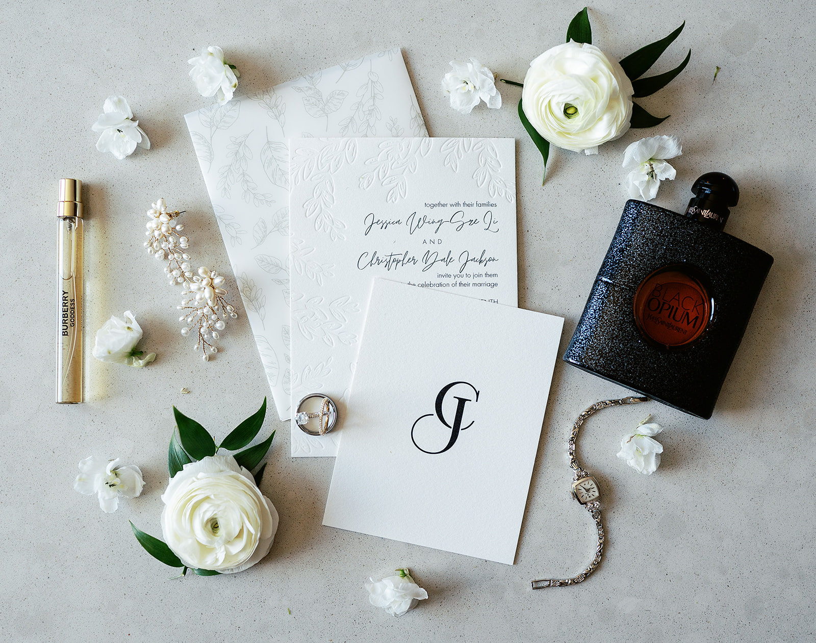 Bridal details sitting on a marble surface