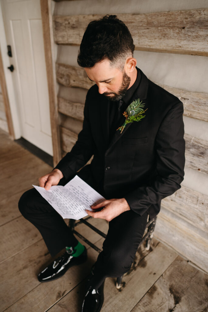 Groom reading note from bride