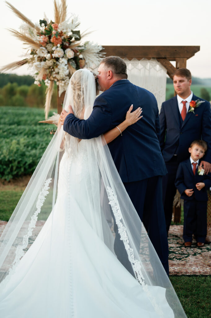 Father giving away the bride