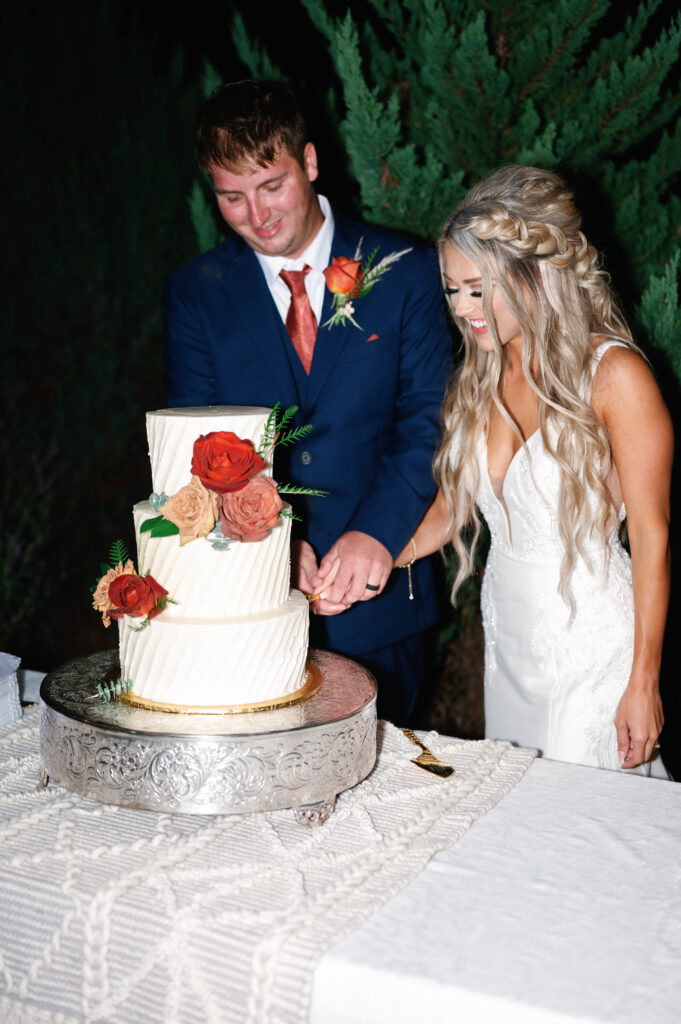 Bride and Groom cutting cake