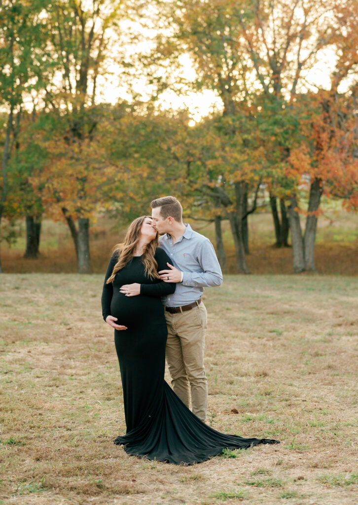 Expectant couple poses for maternity pictures near Nashville, Tennessee. 