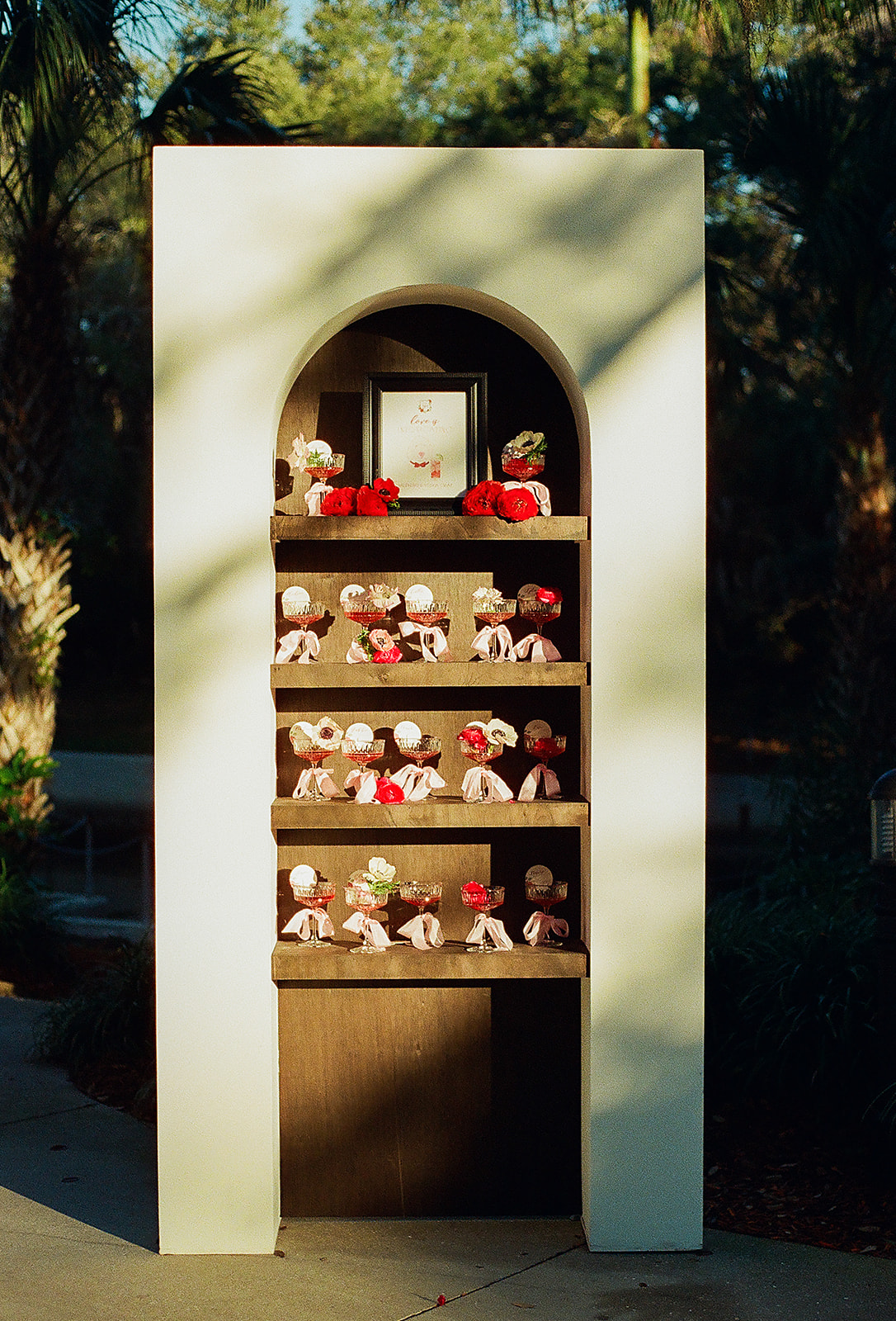 Details of a wedding reception table assignment wall