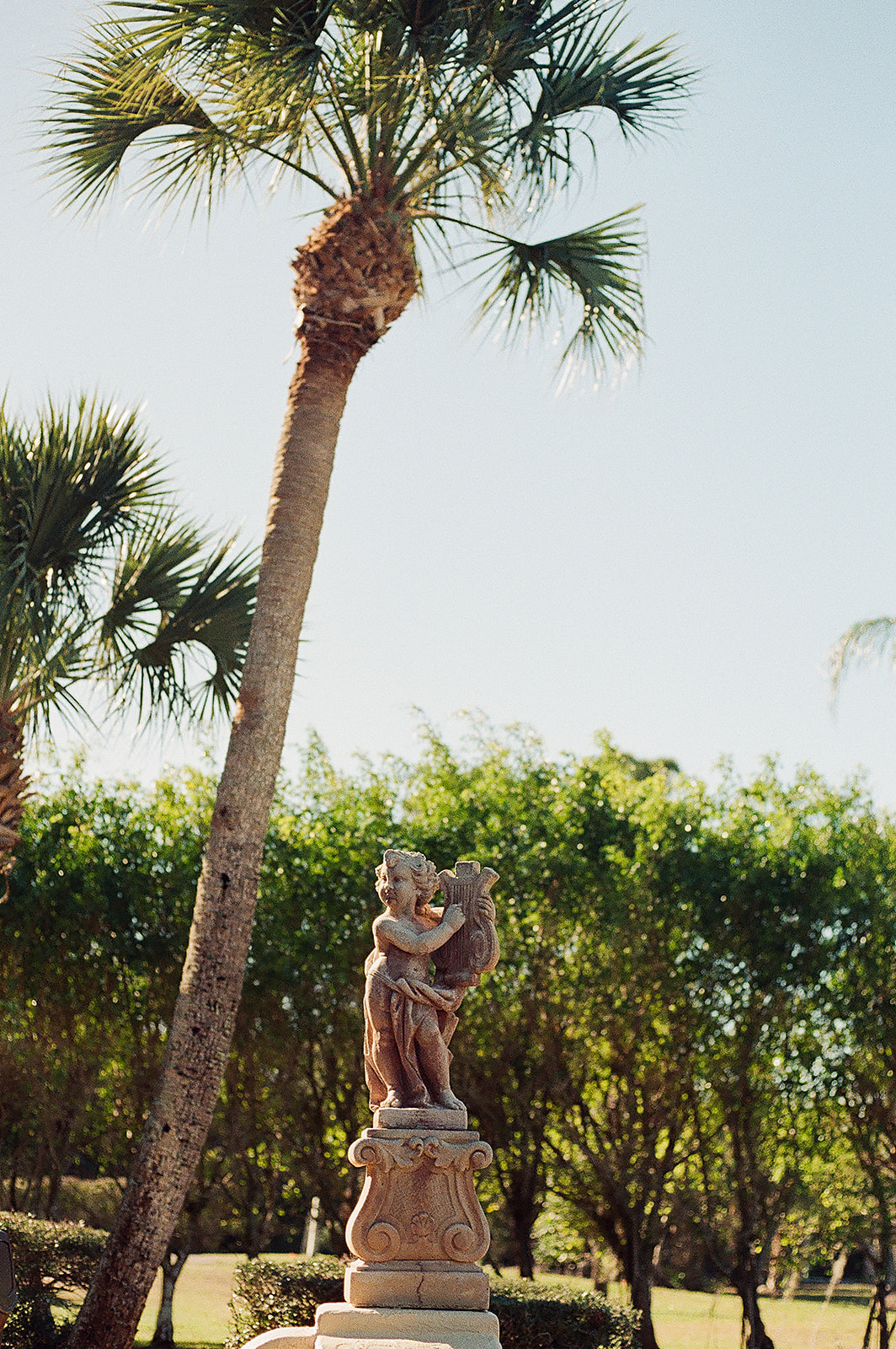 Details of a statue in a garden at the Powel Crosley Estate Wedding